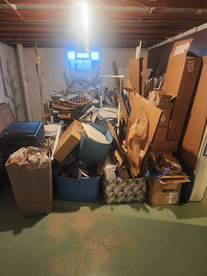 Roll-off dumpster container at job site for Yard Waste Dumpster Rental in Seaside Park